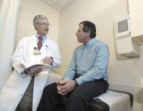 A man with prostatitis at a urologist consultation