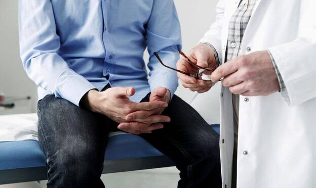 A man at a doctor with symptoms of prostatitis